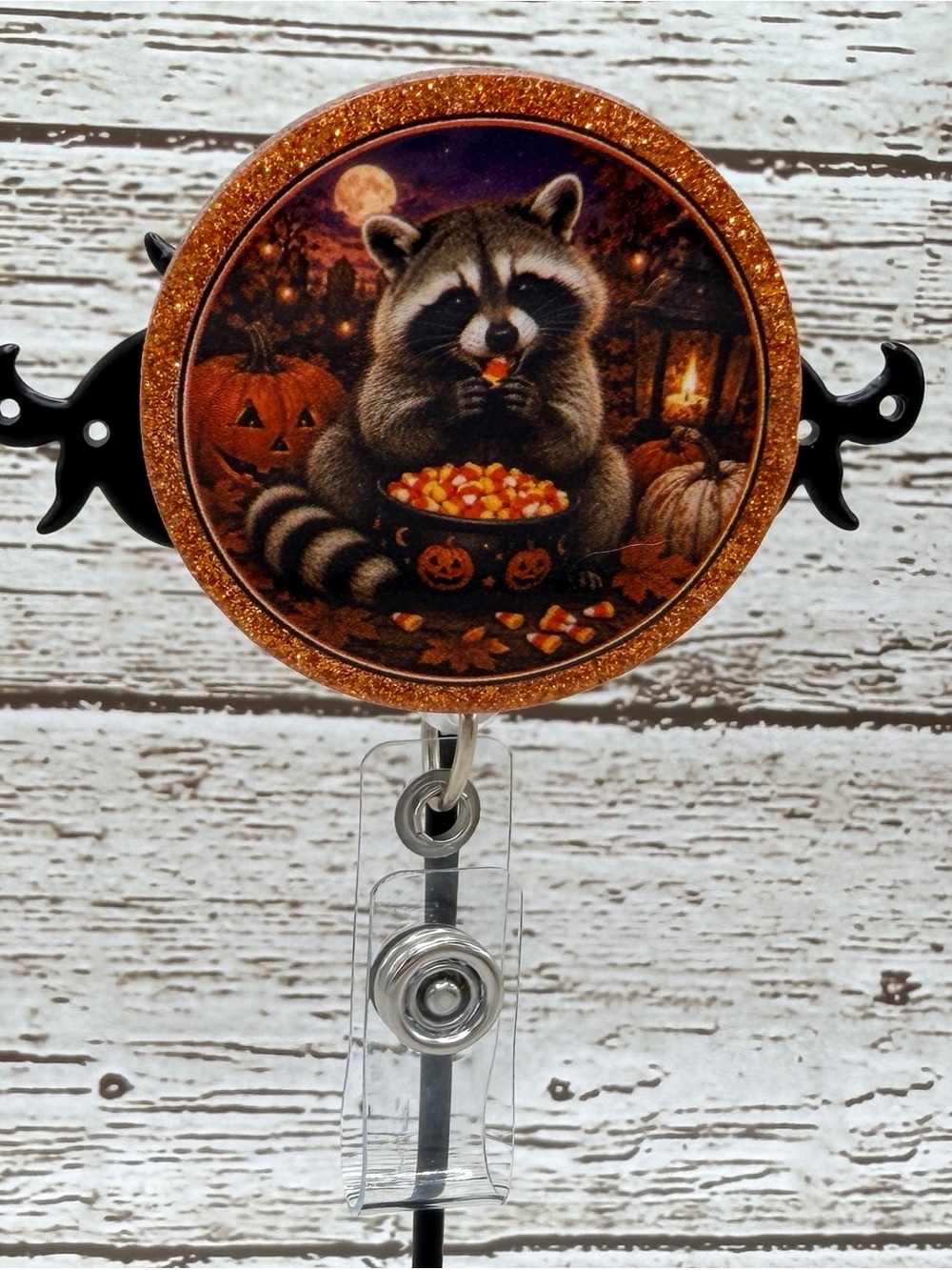 Halloween Raccoon Badge Reel in Orange Glitter
